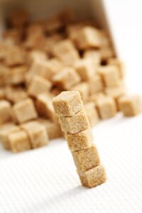 close-ups of brown sugar cubes - food and drink